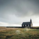 church surrounded by grass