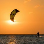 man surfing during sunset