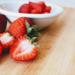 Photo of Strawberries in Bowl on Table.