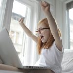 Photo Of Child Putting Her Hands Up