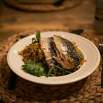 cooked fish on white ceramic plate